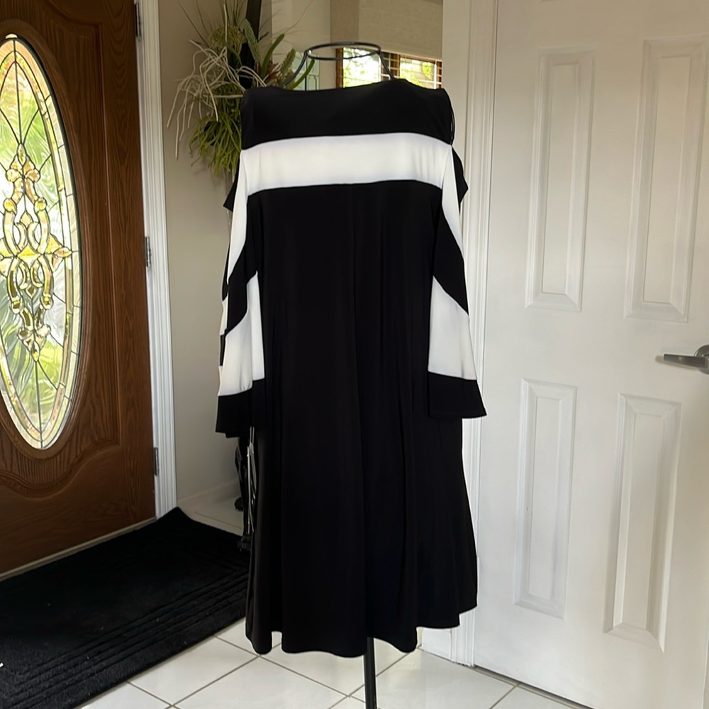Black/white dress below the knee. Great material